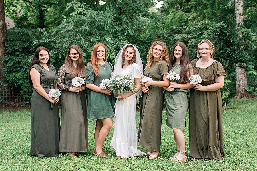 bridal party in shades of green