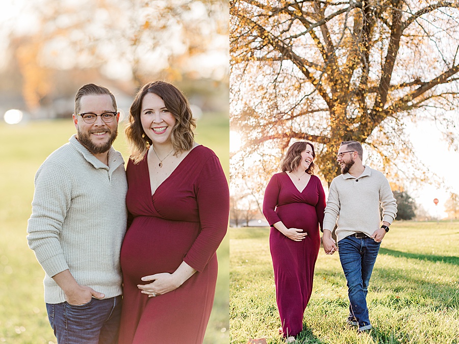 couple walking during maternity session holding baby bump