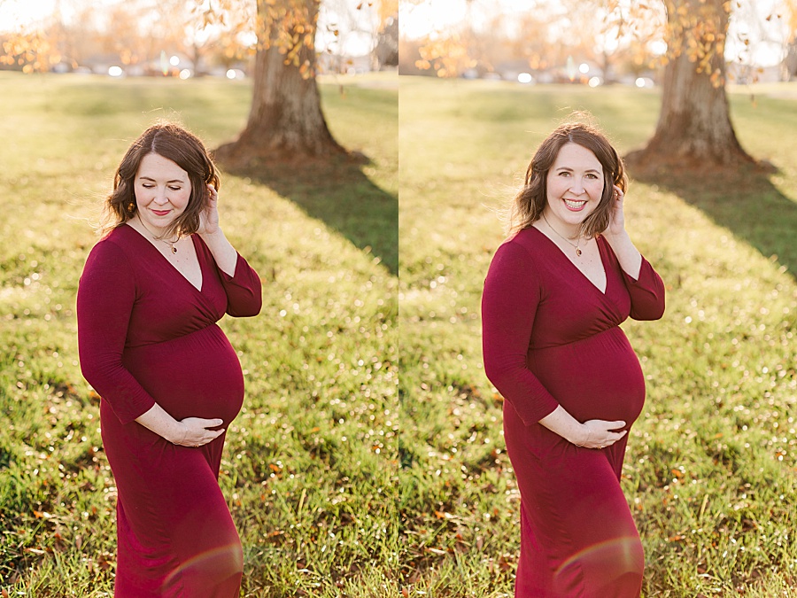 glowing mom to be holding baby bump in fall