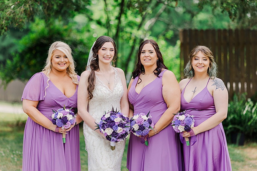 lavender bridesmaids dresses and florals