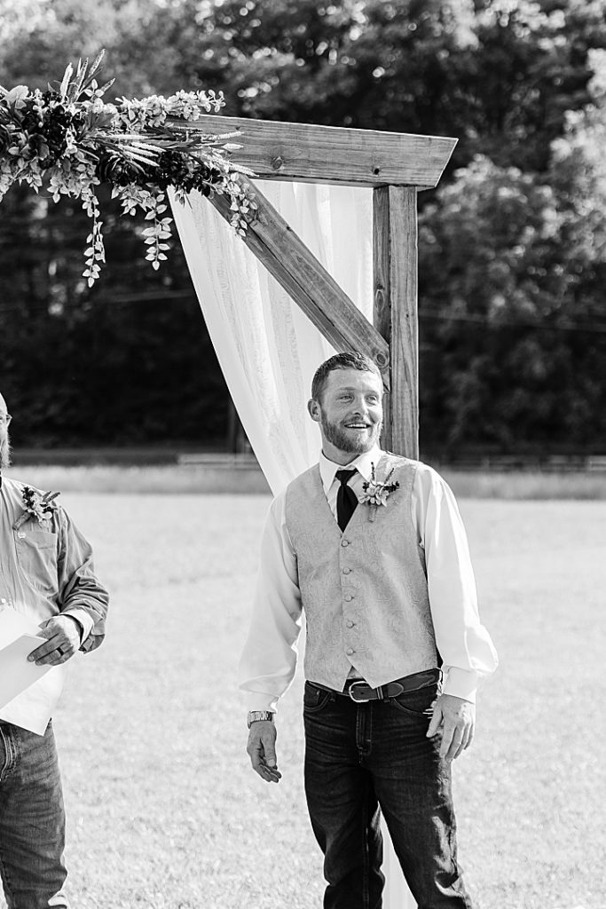 groom seeing bride for first time on wedding day