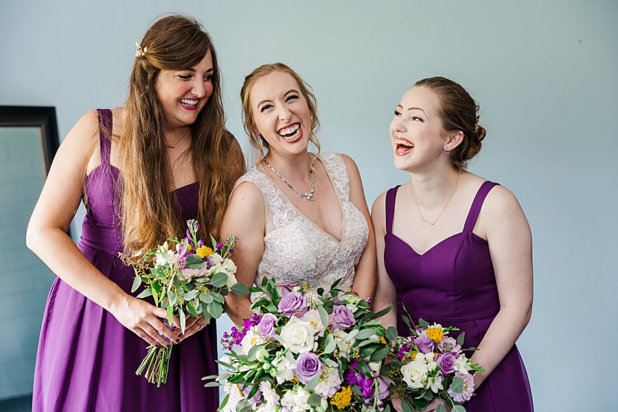 joyful bride and bridesmaids