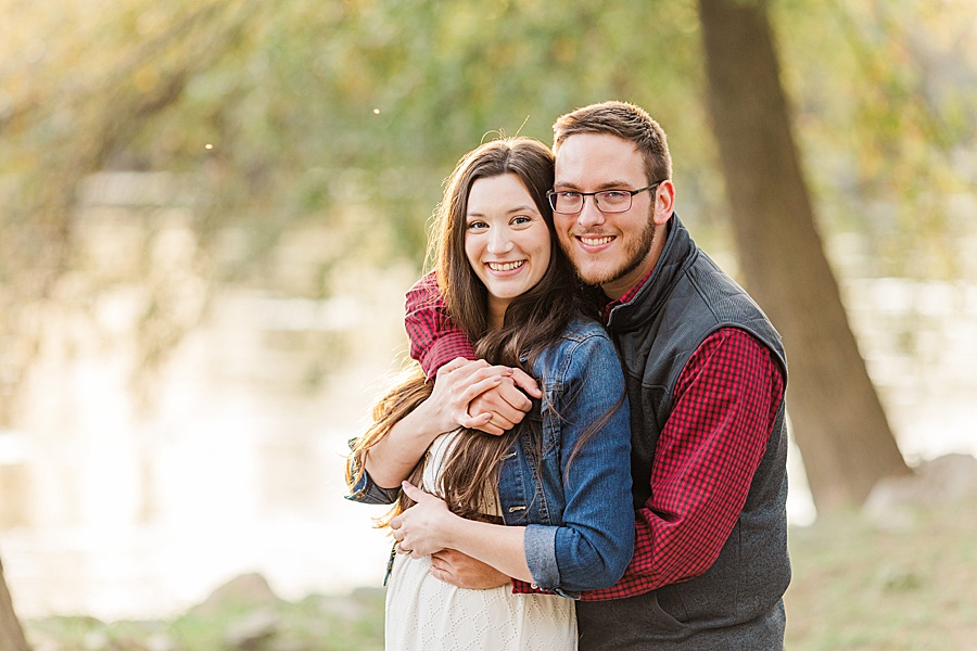 couple hugging by hiwassee river