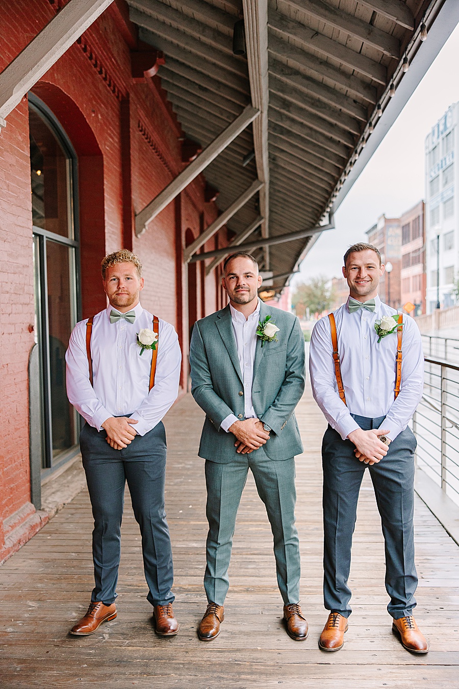 Groomsmen in grey suits at Jackson Terminal in Knoxville TN by Mandy Hart Photo, Knoxville TN Wedding Photographer