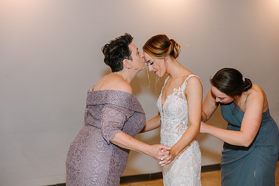 Bride getting ready with mother and sister at Jackson Terminal in Knoxville TN by Mandy Hart Photo, Knoxville TN Wedding Photographer