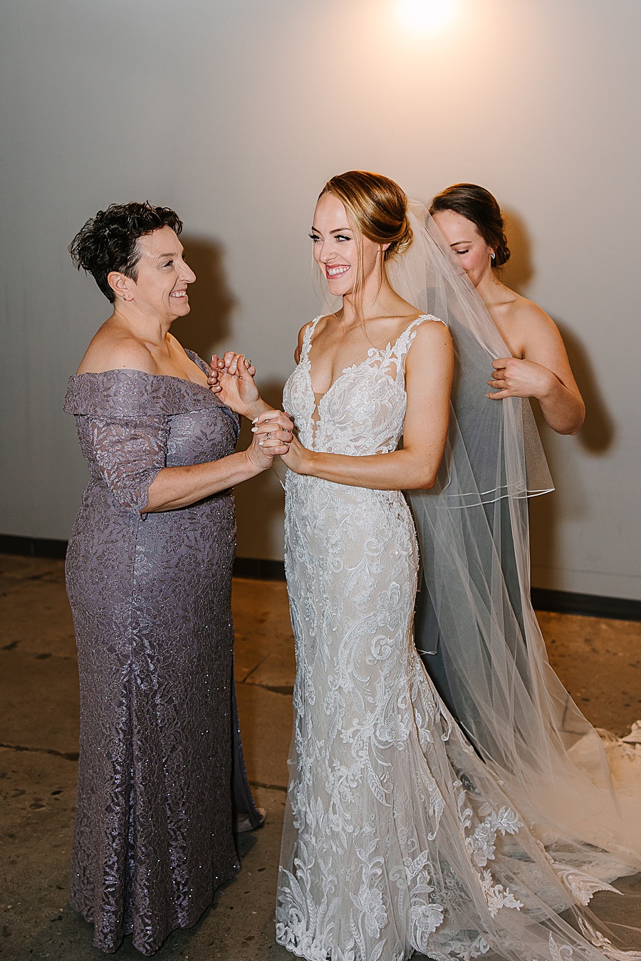 Bride getting ready with mother and sister at Jackson Terminal in Knoxville TN by Mandy Hart Photo, Knoxville TN Wedding Photographer