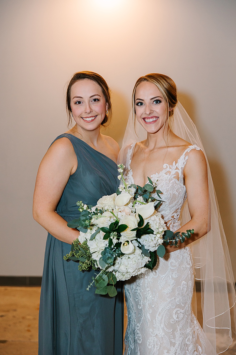 Bride and sister portrait at Jackson Terminal in Knoxville TN by Mandy Hart Photo, Knoxville TN Wedding Photographer