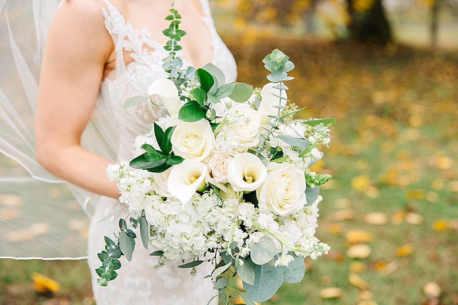 white and green bridal bouquet with calla lilies, hydrangeas and roses