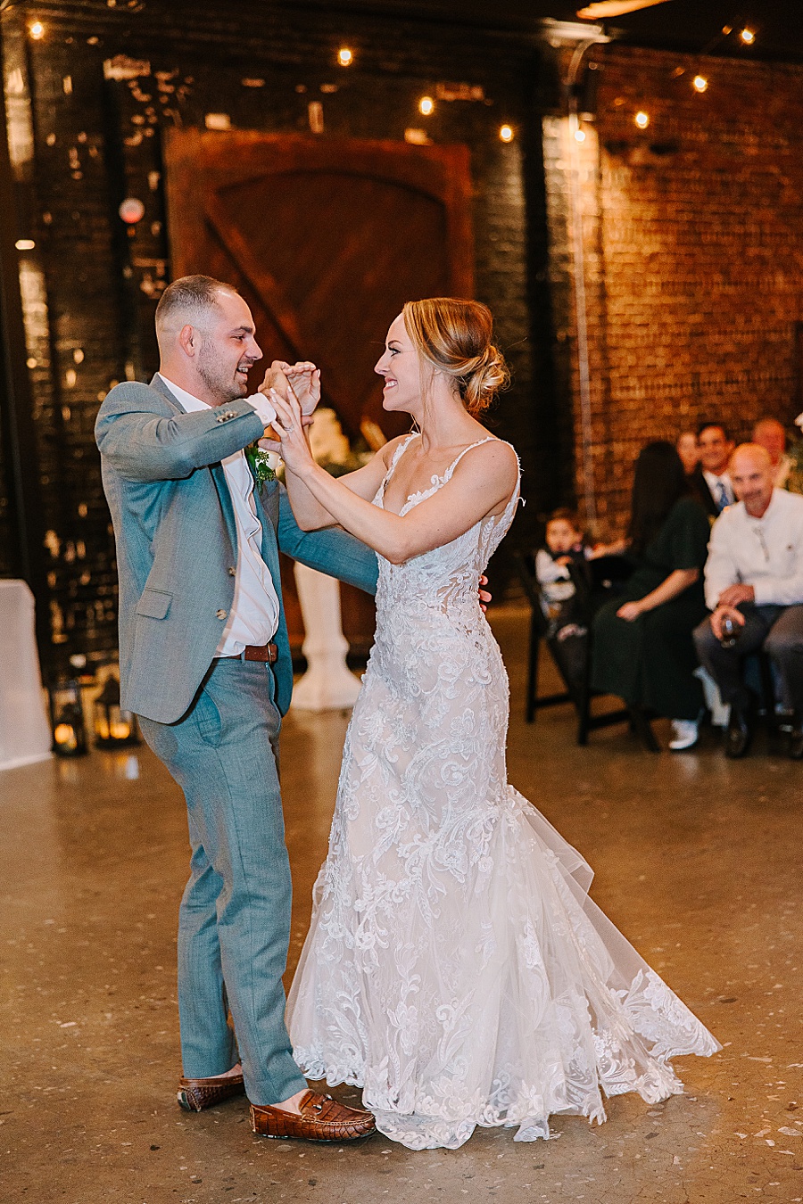 Bride and groom dancing at reception at Jackson Terminal events wedding in Knoxville TN by Mandy Hart Photo, Knoxville TN Wedding Photographer