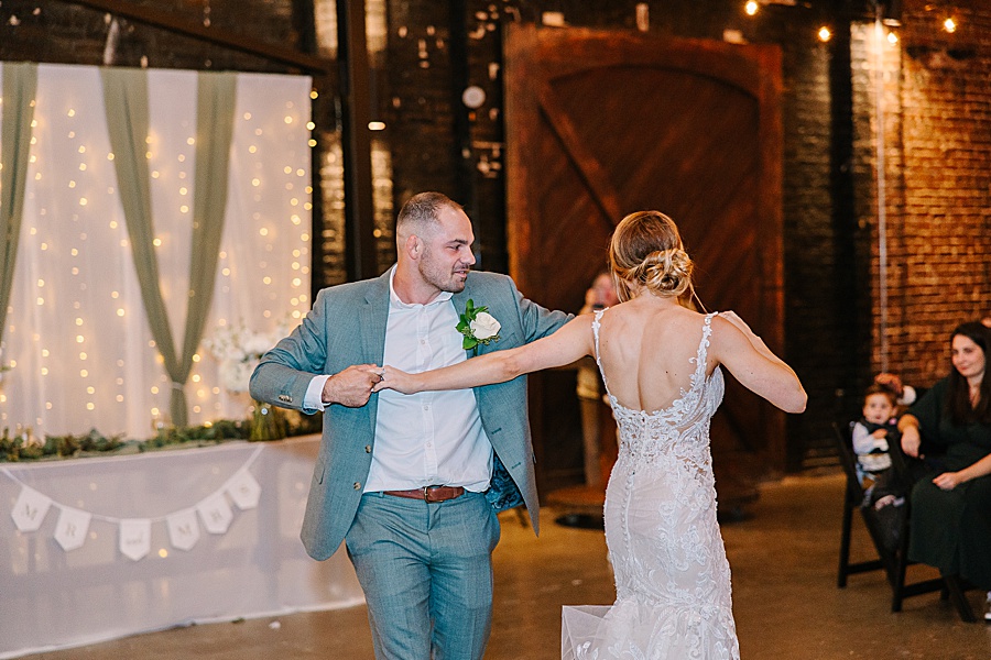 Bride and groom dancing at reception at Jackson Terminal events wedding in Knoxville TN by Mandy Hart Photo, Knoxville TN Wedding Photographer