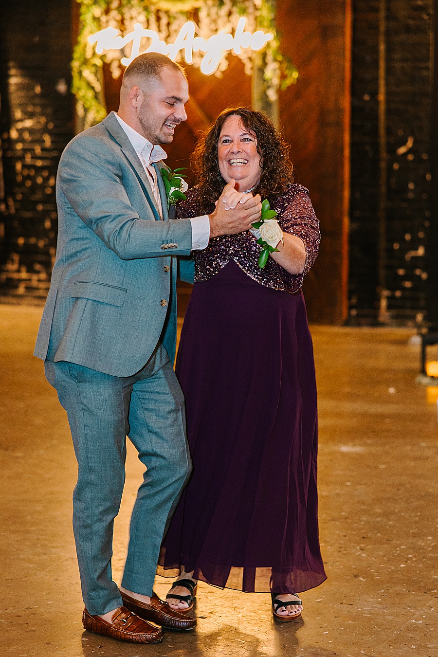 Groom & Mom dancing at reception at Jackson Terminal events wedding in Knoxville TN by Mandy Hart Photo, Knoxville TN Wedding Photographer