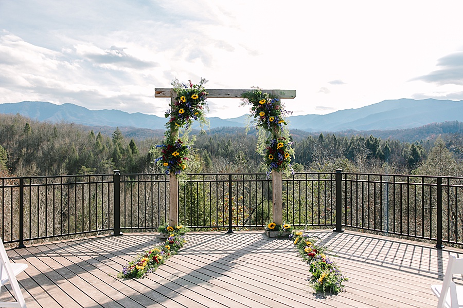 Wedding day arbor with lush fall florals including sunflowers at Venue at Greenbrier Estate by Mandy Hart Photo Knoxville Wedding photographer