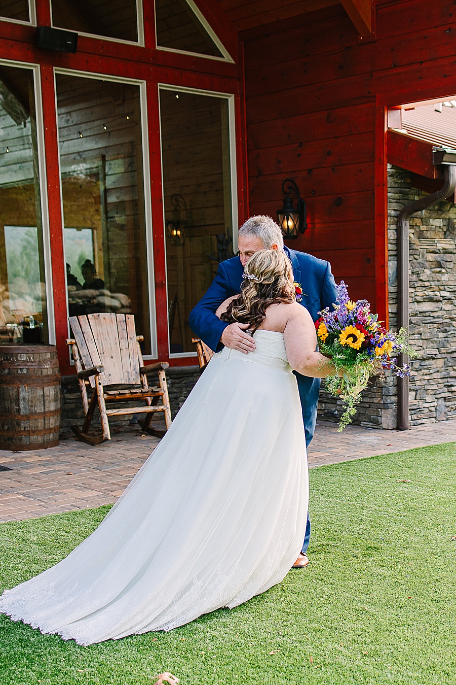 daughter and dad hugging on wedding day at Venue at Greenbrier Estate by Mandy Hart Photo Knoxville Wedding photographer