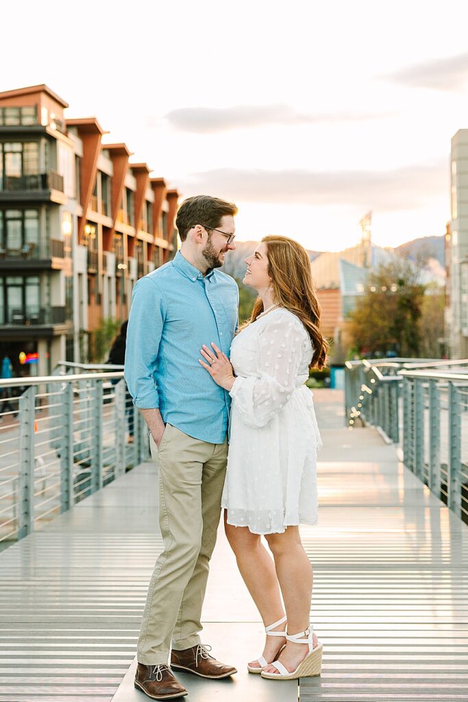 couple looking at each other in the Bluff View Arts District during their downtown chattanooga engagement session