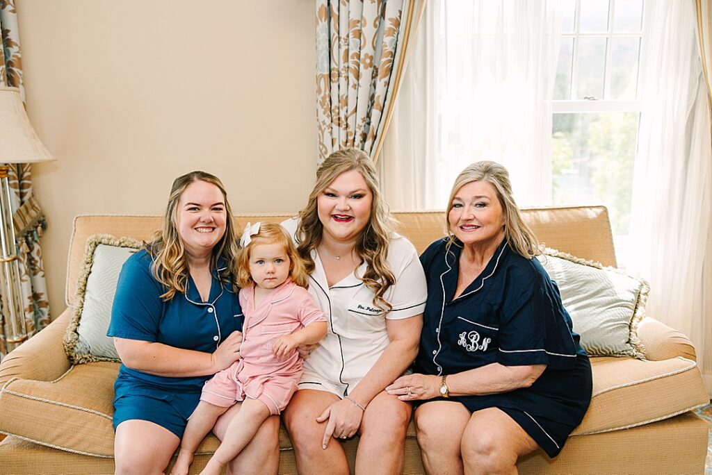 bride and mom and sister in pajamas before wedding