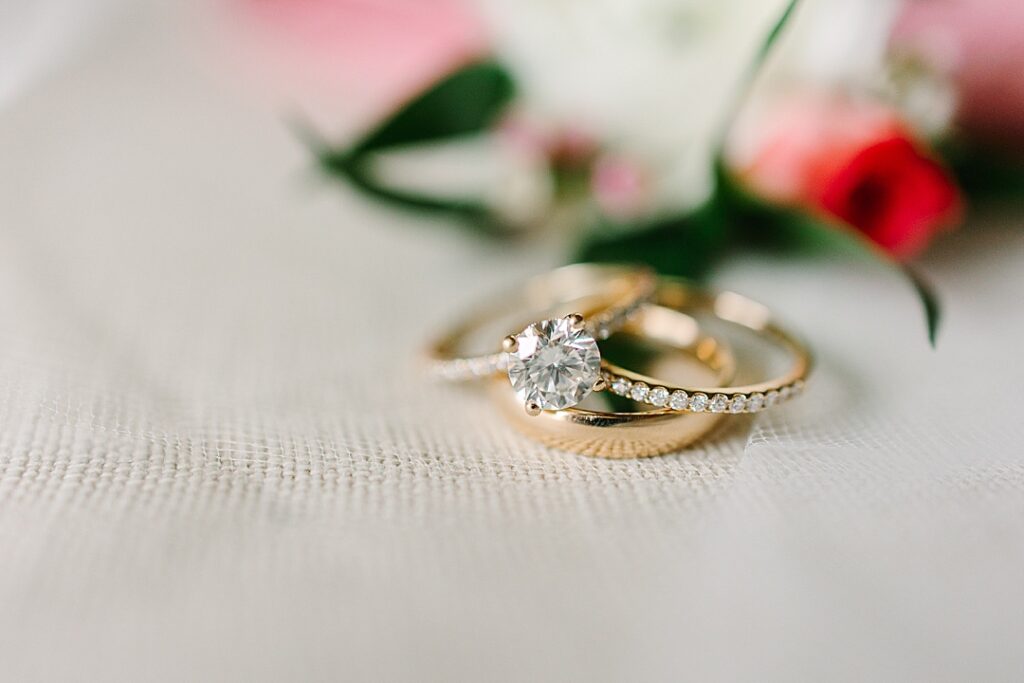 Stack of gold and diamond wedding rings