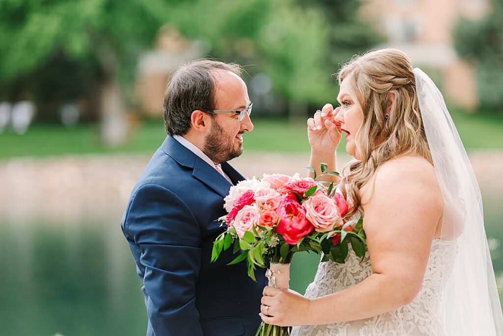 bride and groom crying during first look