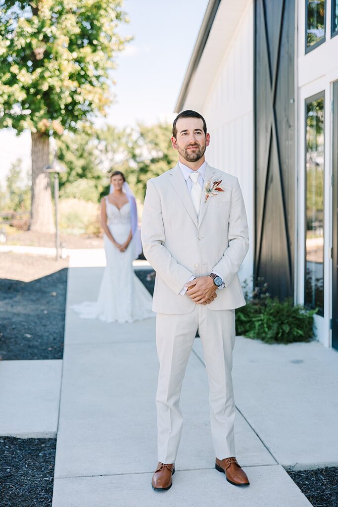 first look with bride and groom at fall wedding at candies creek farm