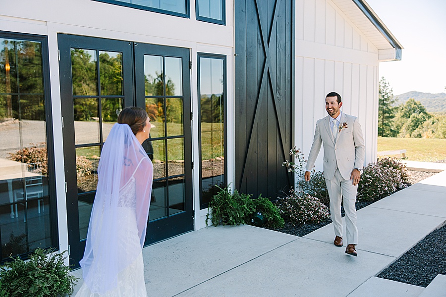 first look with bride and groom at candies creek farm fall wedding