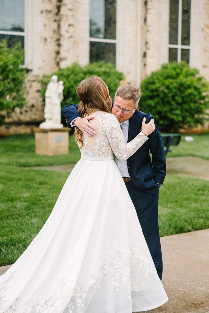 father daughter first look before wedding ceremony