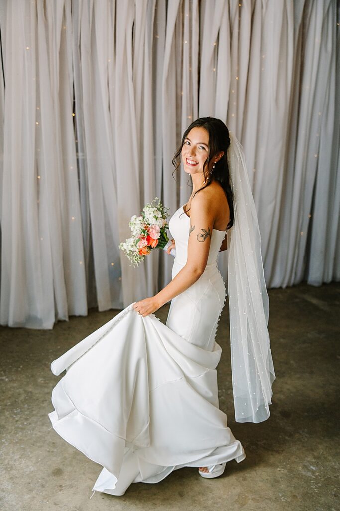 bride twirling on her wedding day
