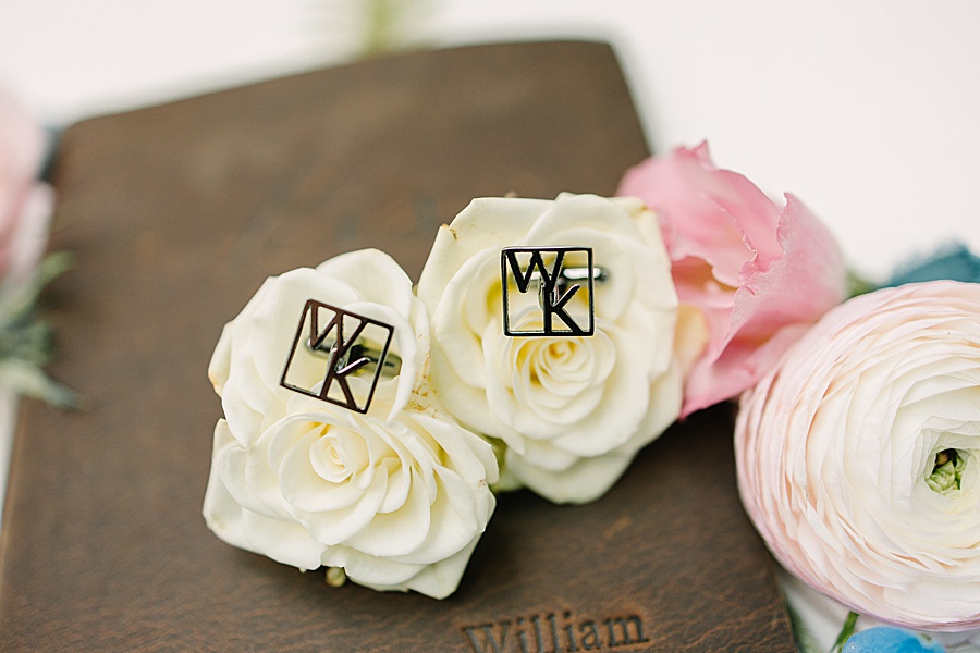 custom cuff links with florals on leather vow books