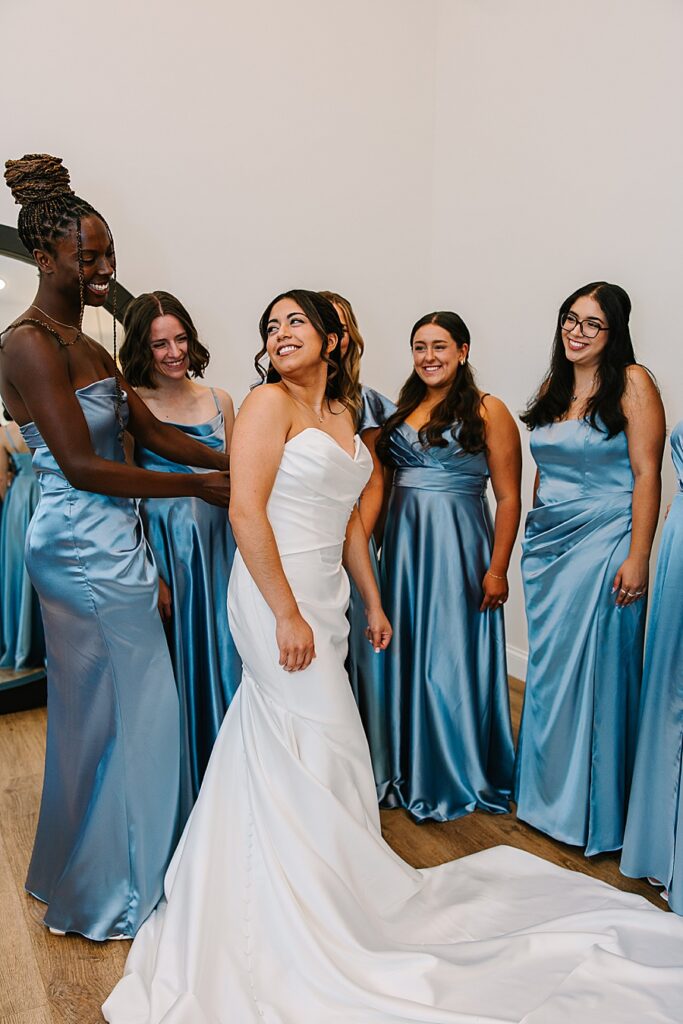 bride and bridal party getting ready in bridal house