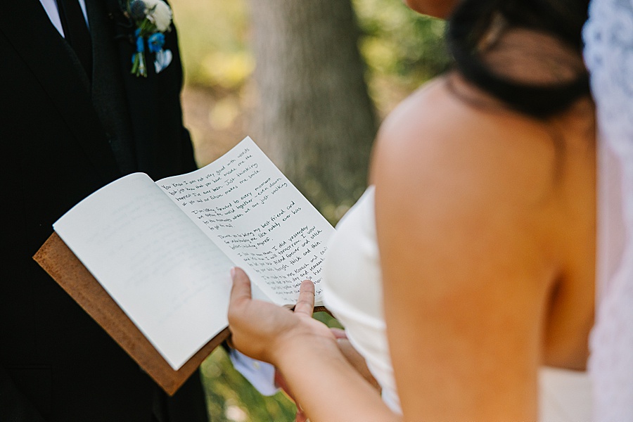 image of bride's vow book while reading private vows before ceremony at Nichols Heir
