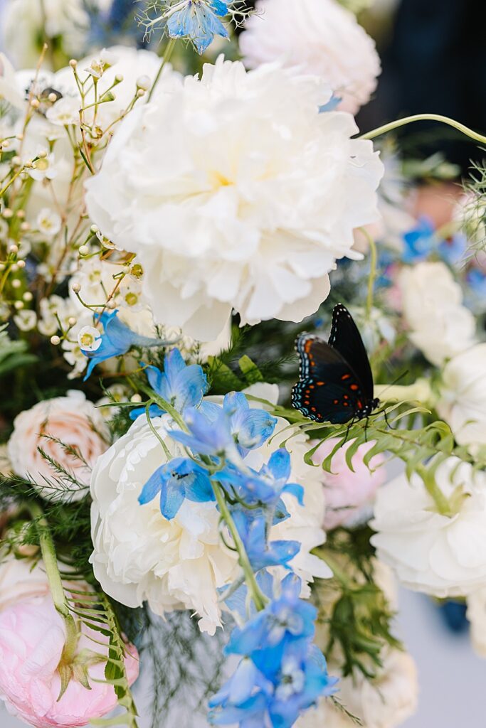 bridal bouquet with a butterfly that landed on it